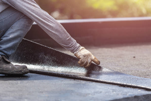 Professional Waterproofing technician working in Spring Arbor, MI